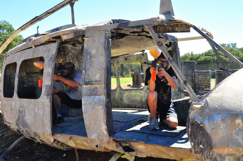 Players using the helicopter prop as cover
